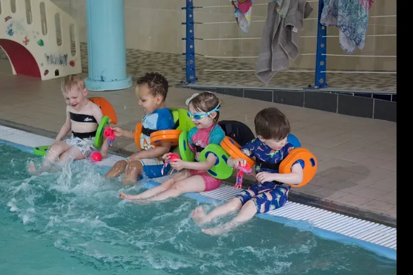 Toddlers poolside at M Swim