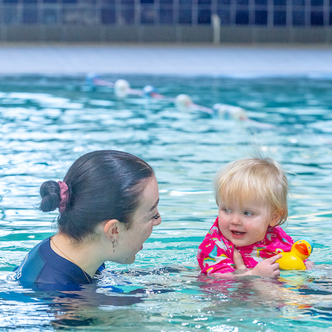 Baby and parent swimming lesson in Stoke-on-Trent
